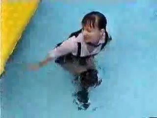 wetlook - schoolgirl in overknees in pool